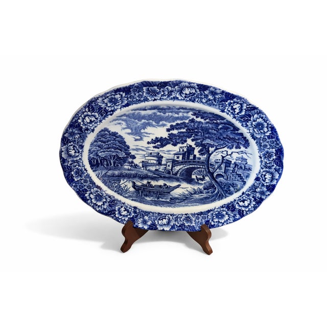 Beautiful antique early 1800s oval platter featuring a stunning blue and white willow pattern. Light wear but in overall...