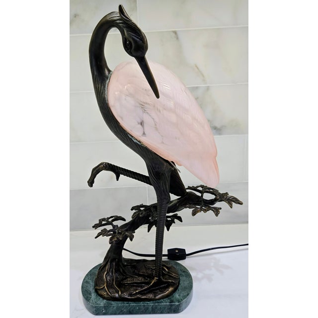 Bring sculptural elegance and soft ambient light to your space with this 1996 Tin Chi heron lamp created for Andrea by...