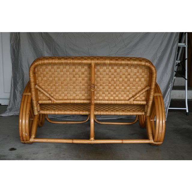 Classic Tropical inspired Pretzel styled loveseat born in the 1950's in the Philippine Islands. Brought into the US by a...