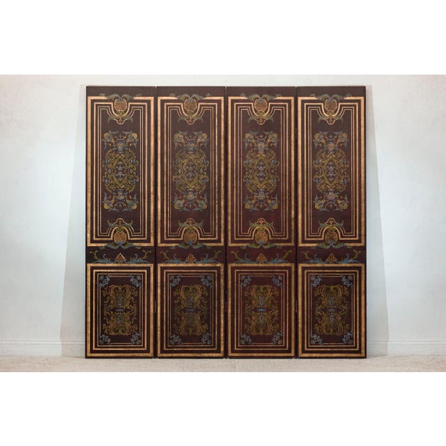 This vintage Chinese four-panel folding screen features a rich dark red-brown ground with hand-painted decorative panels...