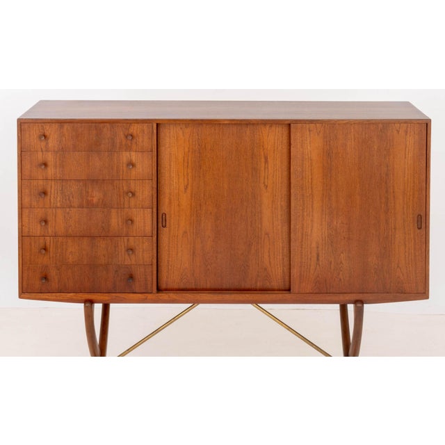 Hans J. Wegner for Carl Hansen &amp; Son CH-304 Teak Sideboard, circa 1950, six drawers on the left and two-door sliding...