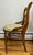 Beautiful vintage ladder-back chair featuring elegant carved rose decoration on the crest rail. Solid wood construction...