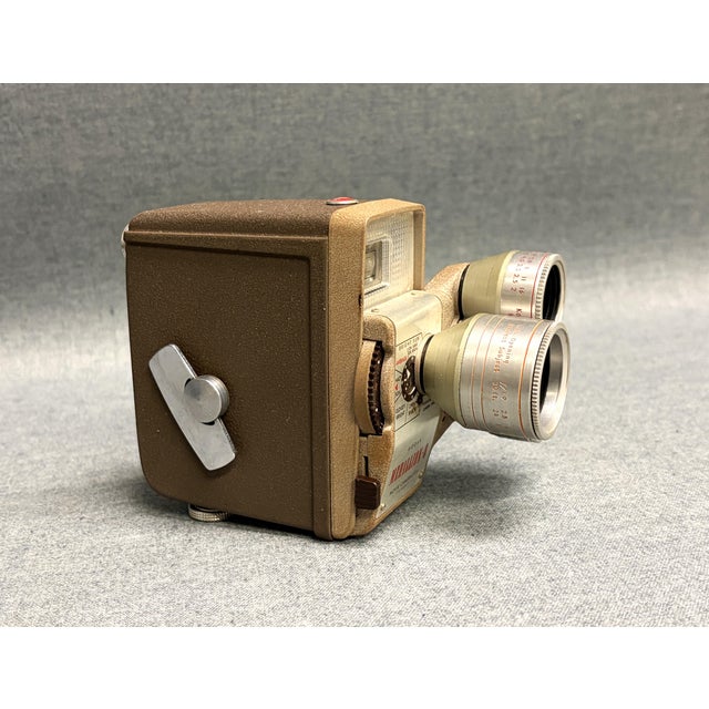 A Kodak Medallion 8 Movie Camera in its original box. The 8mm camera features a turret with standard, telephoto and wide-...
