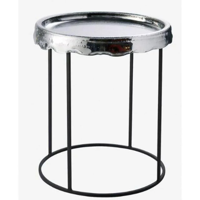 Melt round coffee table by radar. Design: bastien taillard. Materials: metal, glass. Dimensions: w 44 x d 44 x h 51 cm....
