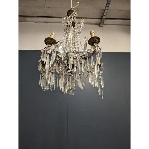 Chandelier in Bronze and Glass with Tassels, in Very Good conditions. Up to 250V (Europe/UK Standard).The wiring of this...