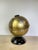 Vintage novelty transistor radio by Vista, model NTR-6G, made in Japan. Designed as a tabletop globe in gold and silver...