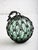 Antique Japanese fishing float crafted with hand blown green glass and knotted rope. Two available sold separately.