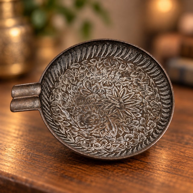 Beautiful vintage circa 1960s - 1970s brass ashtray from India, featuring an intricately engraved floral and foliage...