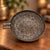 Beautiful vintage circa 1960s - 1970s brass ashtray from India, featuring an intricately engraved floral and foliage...