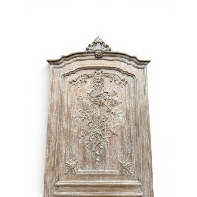 A beautiful 19th century French trumeau mirror crafted in carved walnut with a later painted finish and original silvered...