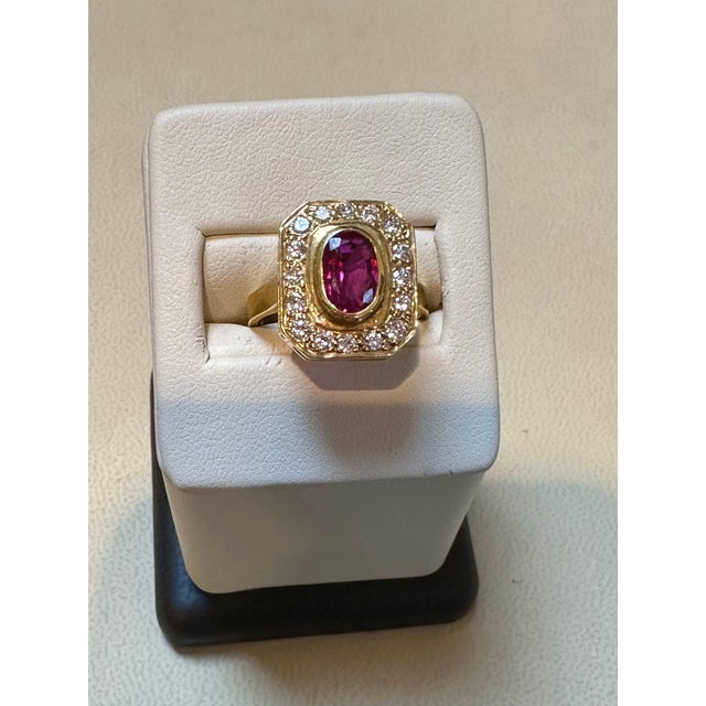 1.4 Carat Natural Oval Ruby and 0.80 Carat Diamond 18 Karat Gold Ring For Sale - Image 4 of 18