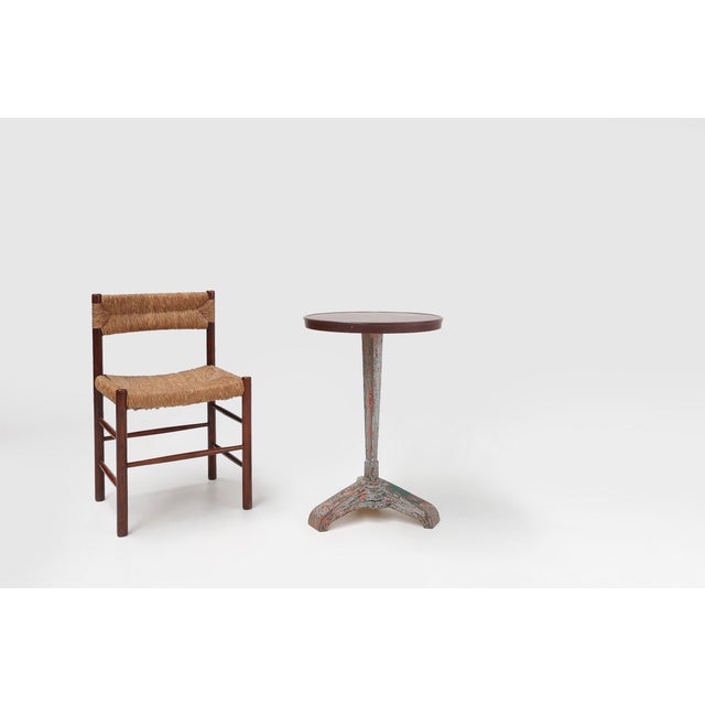 Rare to find bistro table made of a circular red bakelite tray stamped Rex and a black cast iron base bearing the logo of...