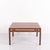 Square rosewood coffee table from Danish furniture production in the 1960s. The table has a simple design with a square...