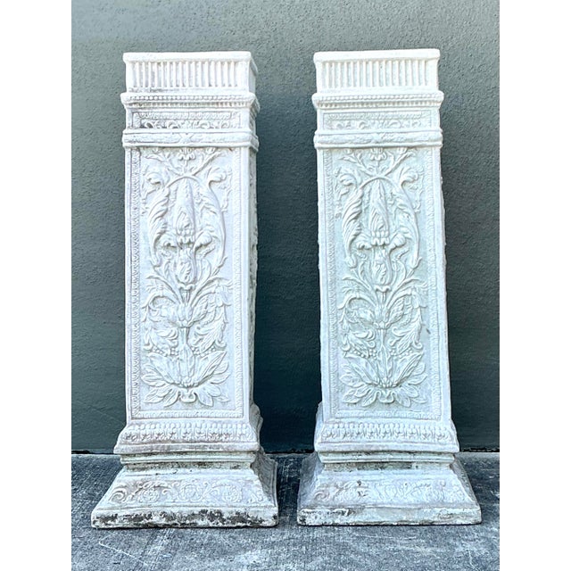This exquisite pair of vintage pedestals is a masterclass in Neoclassical architectural design, perfectly capturing the...