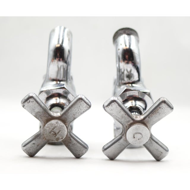 Vintage wall mount chrome plated brass faucets, often identified as antique shut off valves or single basin taps. They...