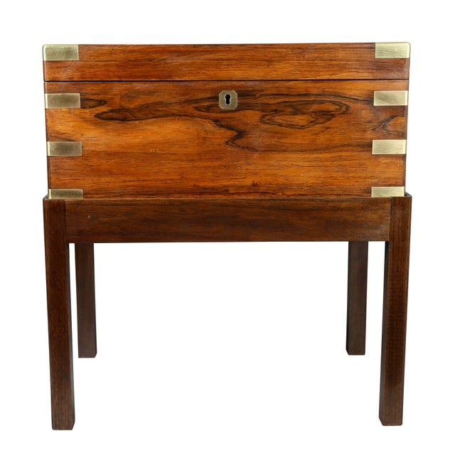 With nicely fitter interior. Finely made with small side drawer. This item includes restricted materials and can not be...