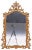 French Louis XV style giltwood wall mirror, 20th century, featuring a shaped frame with a pierced floral crest and...