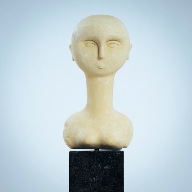 Modernist bust sculture of a woman in sandstone, with a hard stone base. Artist unknown. The sculpture is beautiful from...