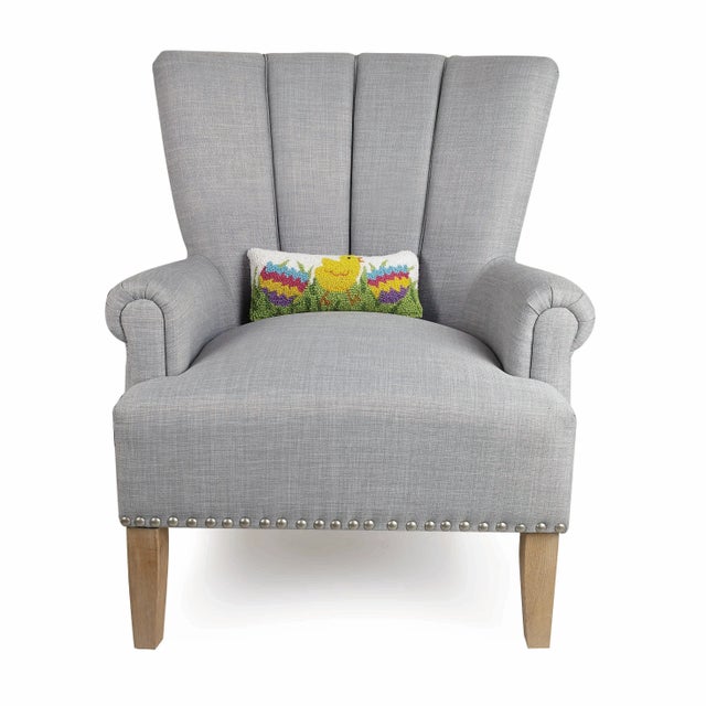 100% Wool Hooked throw pillow. Velvet/Cotton backing. Polyester Blown-in filled. Care Instructions: Spot Clean.