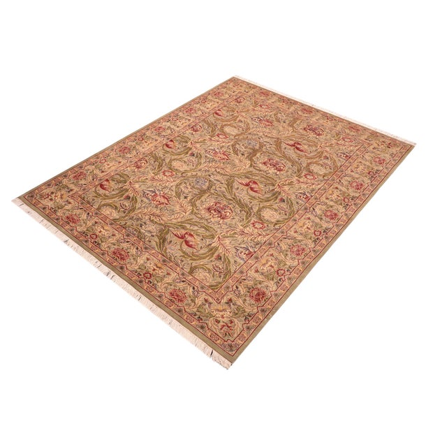 Designed with mesmerizing intricacy and gorgeous color palette, this hand-knotted masterpiece demonstrates the beauty and...