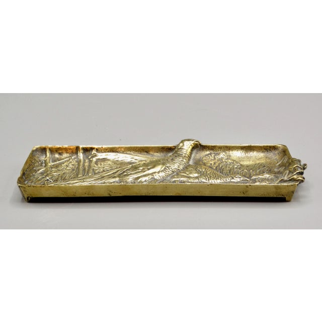 Circa 1890 fine quality French gilded bronze pen tray. It is well cast solid bronze with lovely detail and depicts several...