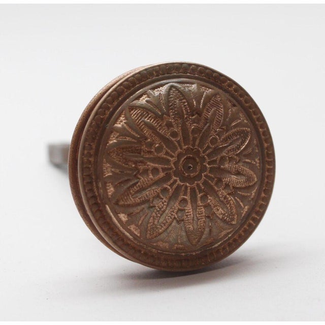 This Classic Vernacular style radial bronze door knob was made by Hopkins & Dickinson in the 1879 catalog. It is part of...