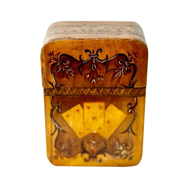 An antique wooden playing card box with two sets, one hundred and four, old playing cards. Late 19th century, England.