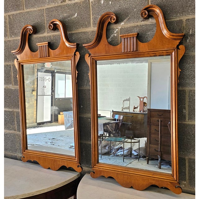 Pair of Kling Factories Chippendale Maple Scroll Ears Wall Mirrors. Measures 26" in width, 1.5" in depth and 44.5" in height.