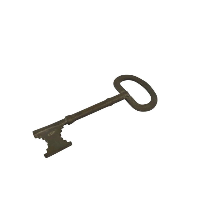 Mid-century oversize brass key paperweight. No maker's mark. Minimal age wear.