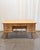 A substantial Danish oak writing desk attributed to Henning Kjærnulf, produced in the 1970s and bringing together the...