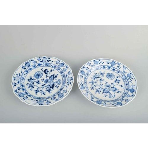 Meissen, Blue Onion 2 lunch plates, early 20th century. Porcelain plates with the classic Blue Onion decoration, hand-...