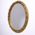 Beautiful oval mirror, gilded and carved wood, late 20th century Italy. Dimensions: 90x70 cm Depth: 8 cm