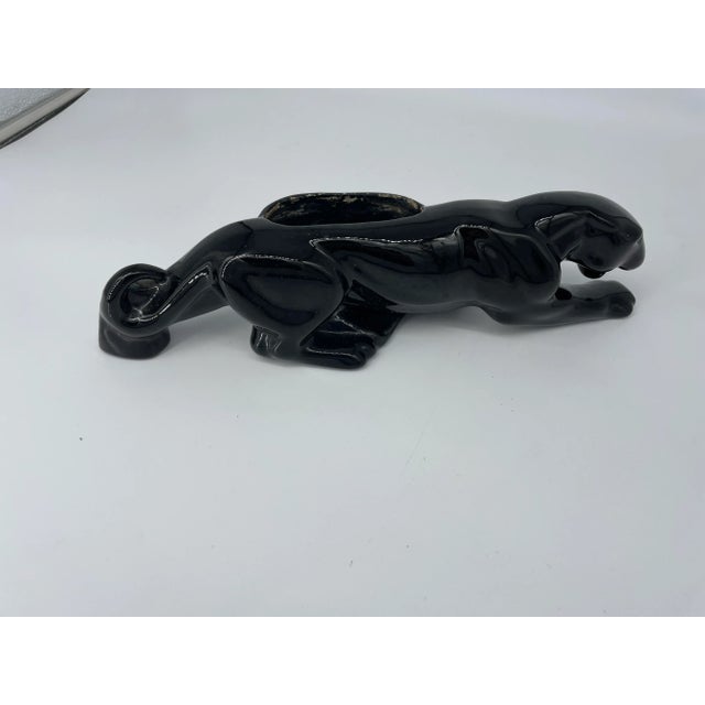 Sleek mid-century Haeger black panther ceramic planter. Iconic Mid Century piece!