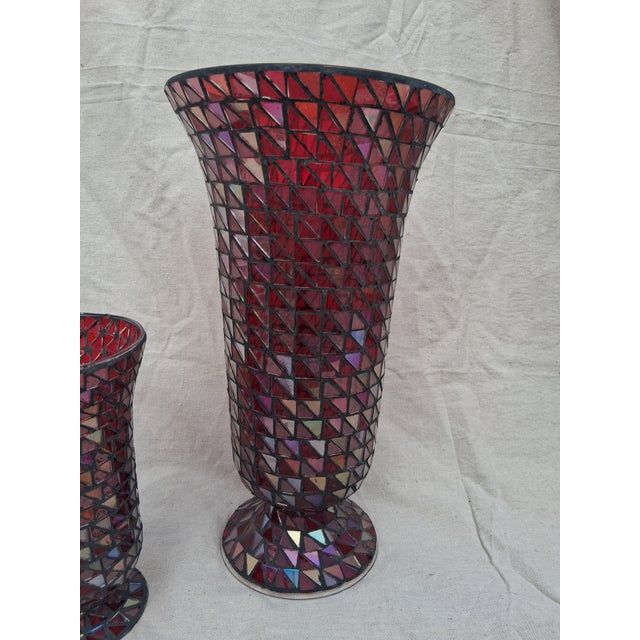 2 Ornate Ruby Red & Iridescent Mosaic Vases in good condition. You'll make an impression on your guests when the light...