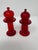 Cute pair of Ruby Red salt and pepper shakers from Murano, Italy. Measure 4" tall.