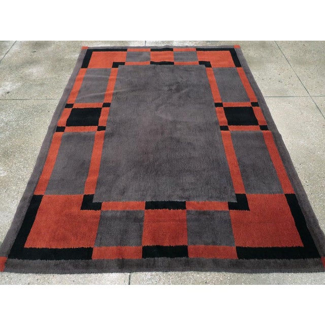 A vintage French Art Deco accent rug handmade during the mid-20th century. Measures: 5' 8" x 7' 7"