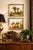 A captivating pair of antique 19th-century hand-painted porcelain plaques, each depicting an idyllic pastoral scene with...