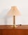 Danish table lamp, produced by HEMI in the 1960s, with a gold-plated metal frame and an ivory-colored pleated lampshade....