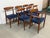 Design Plus Gallery presents a Set of Eight Danish Mid 20th Century Modern Dining Chairs designed by Arne Hovmand-Olsen...
