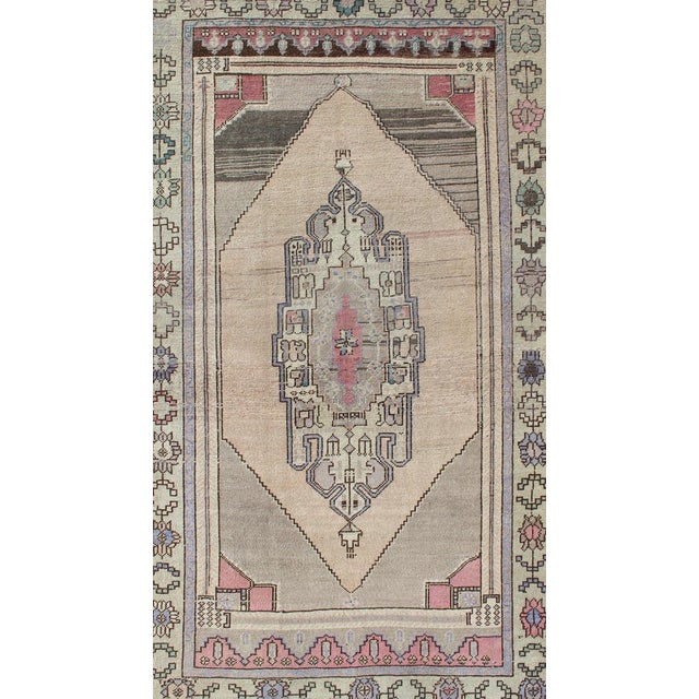 Measures: 5'0 x 8'8. Vintage Turkish Oushak Rug in Soft Beige, Faded Rose, and Muted Lavender. Keivan Woven Arts / rug TU-...