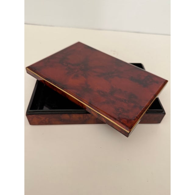 Gorgeous Lacquerware faux Tortoise Shell covered box by Otagiri. The slightly beveled top has a handpainted gold leaf...