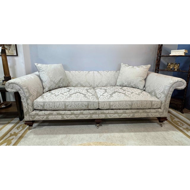 Ralph Lauren Heiress Sofa, made by EJ Victor. This grand sofa features rolled arms that continue across the backside, and...