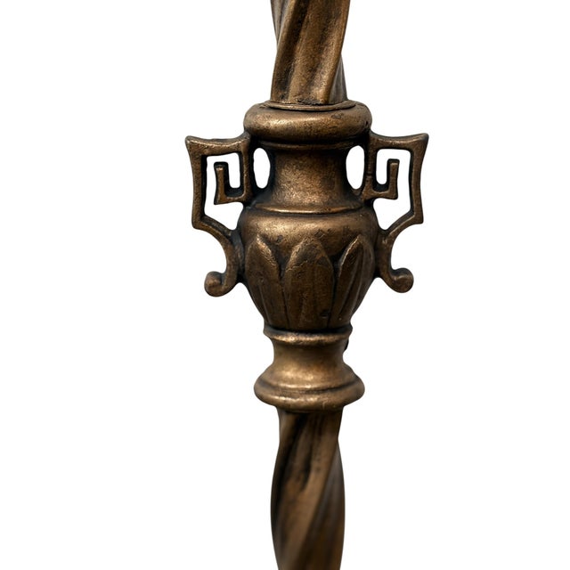 Antique floor lamp from the 1920s with twisted column and decorative urn. It's topped with a vintage wire mesh shade made...