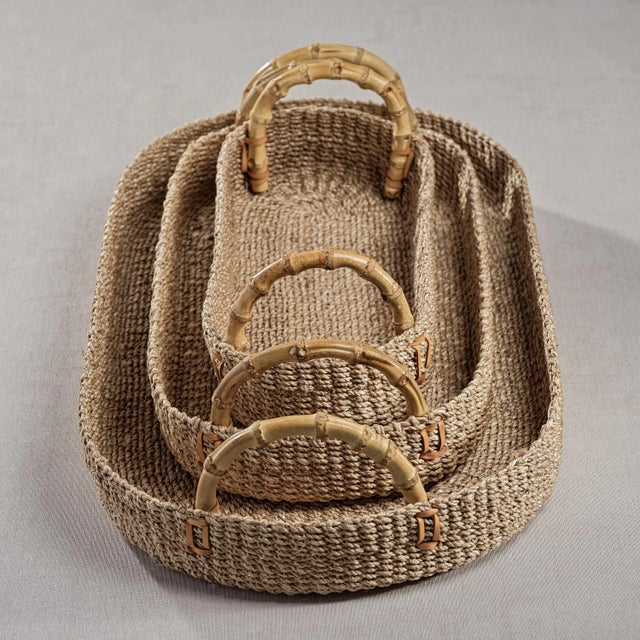 This stunning tray is made from abaca with curved bamboo handles. The natural design exudes coastal and global vibes,...