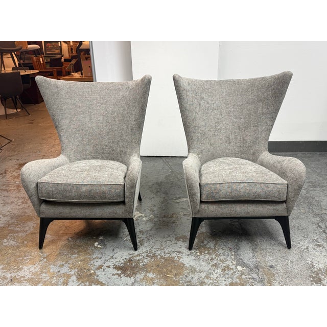 Design Plus Gallery presents a Pair of the Whats New Pussycat Armchairs from Caracole. This distinctive pair has flared...