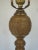 Tall and sculptural hefty brass candlestick form table or buffet lamp in the manner of famed designer James Mont...