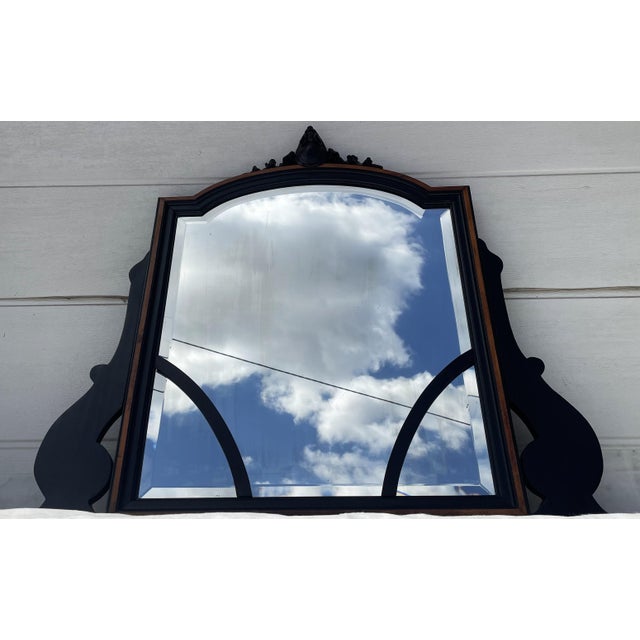 An exceptional Gothic Revival / Historicist mirror, dating from the late 19th to early 20th century. Featuring a refined...