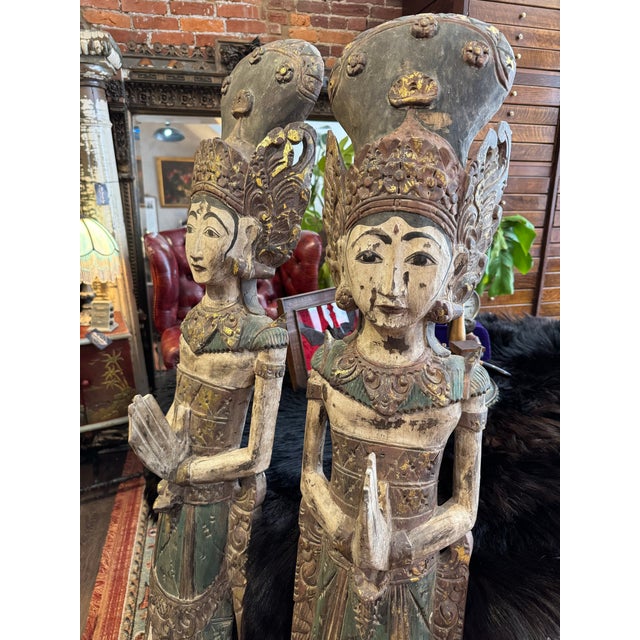 Beautiful pair of antique Indonesian Rice Goddesses (Dewi Sri). Revered in Java, Bali & Lombok for her role as the goddess...