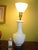 The color and embossed flowers, large daisy petals on the surface of this lamp make it hard to resist. The lampshade glass...
