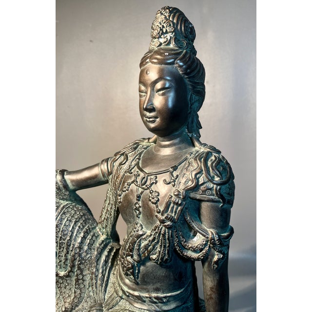 Buy art with your heart. This wonderful sculpture will give character to any room or entryway. This is the Goddess Guan...